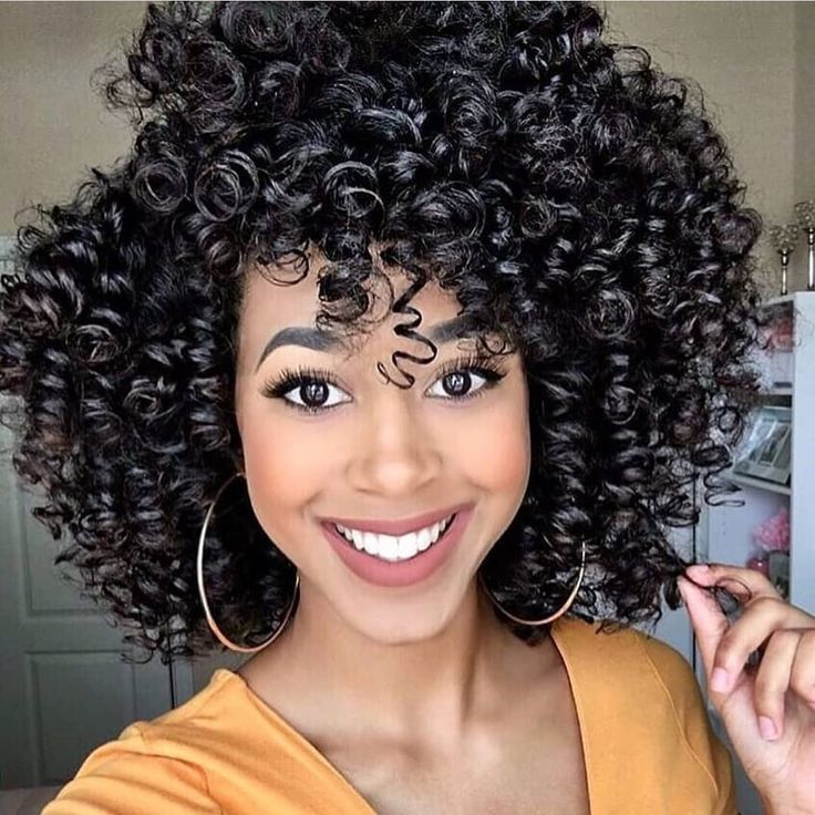 26 Most Iconic Curly Hairstyles Of All Time